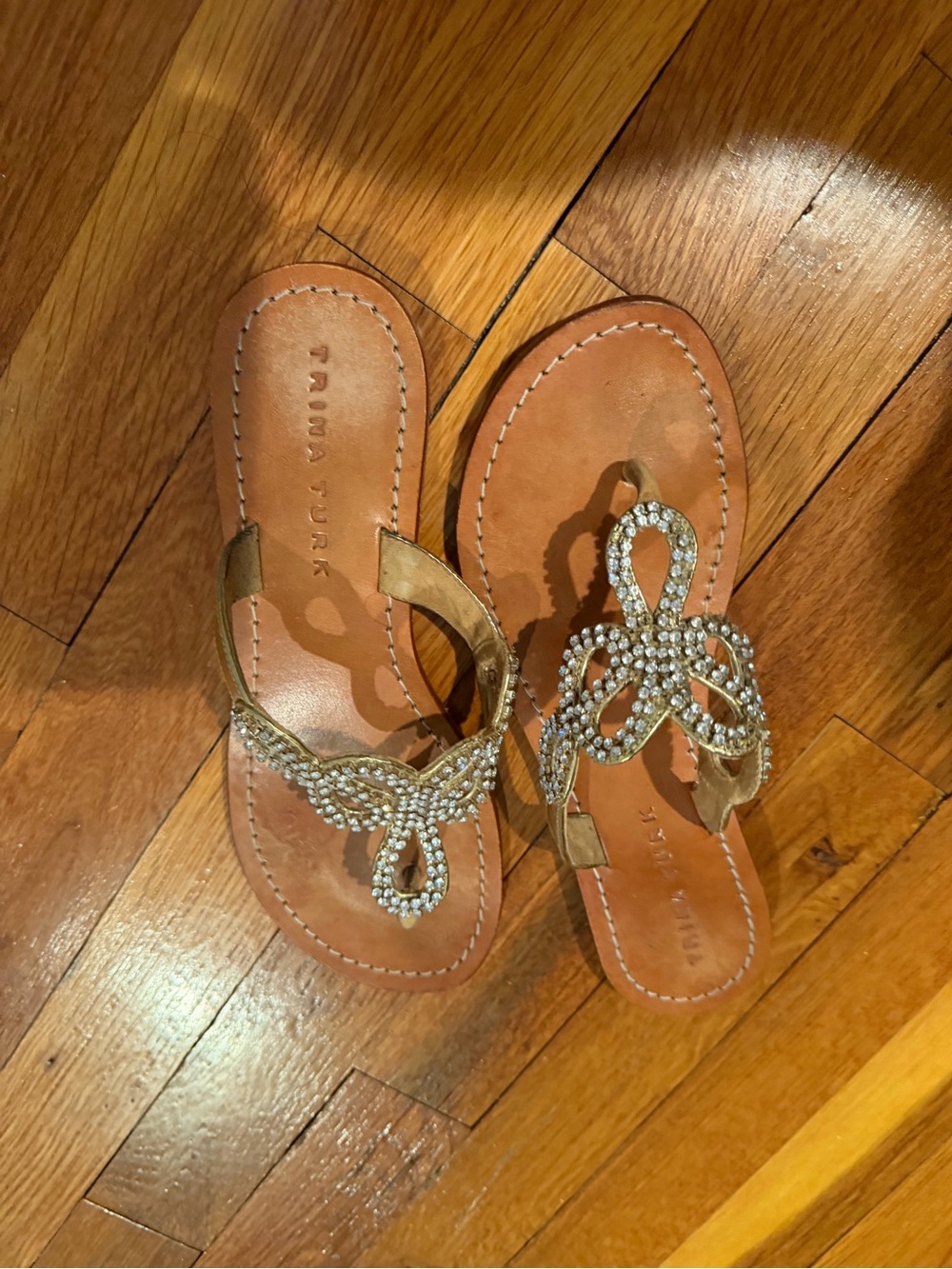 Trina Turk Gold Jeweled Leather Thong Sandals
